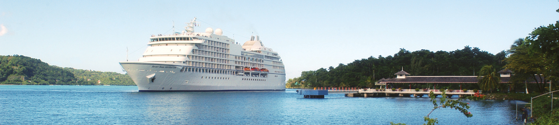 Regent Seven Seas Navigator cruise ship docked in the Caribbean
