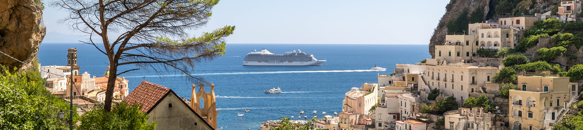 Oceania cruise ship sailing past the Amalfi Coast in Italy