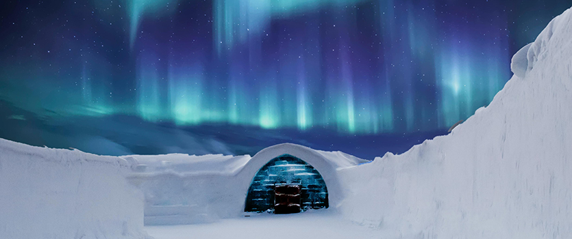 Northern lights over an igloo hotel in Northern Europe